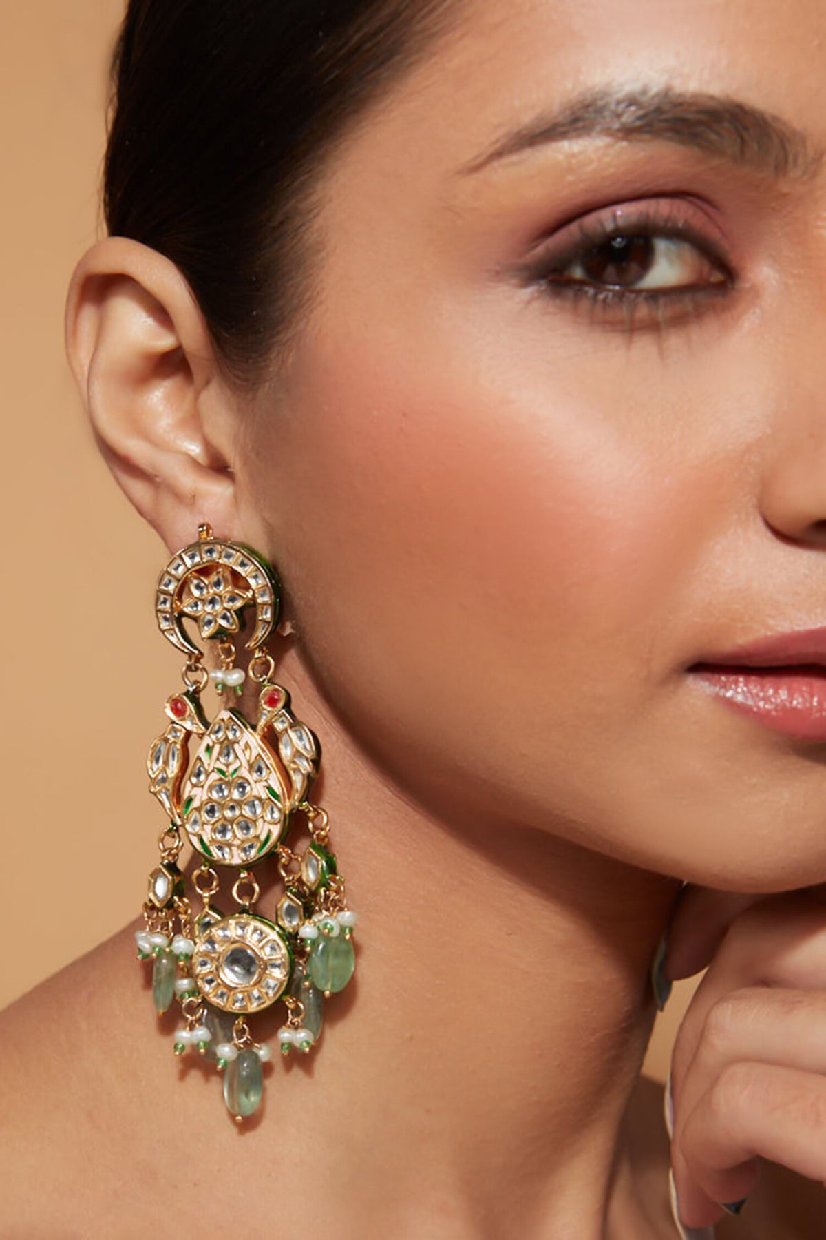 Tear Drop Carved Kundan Embellished Earrings