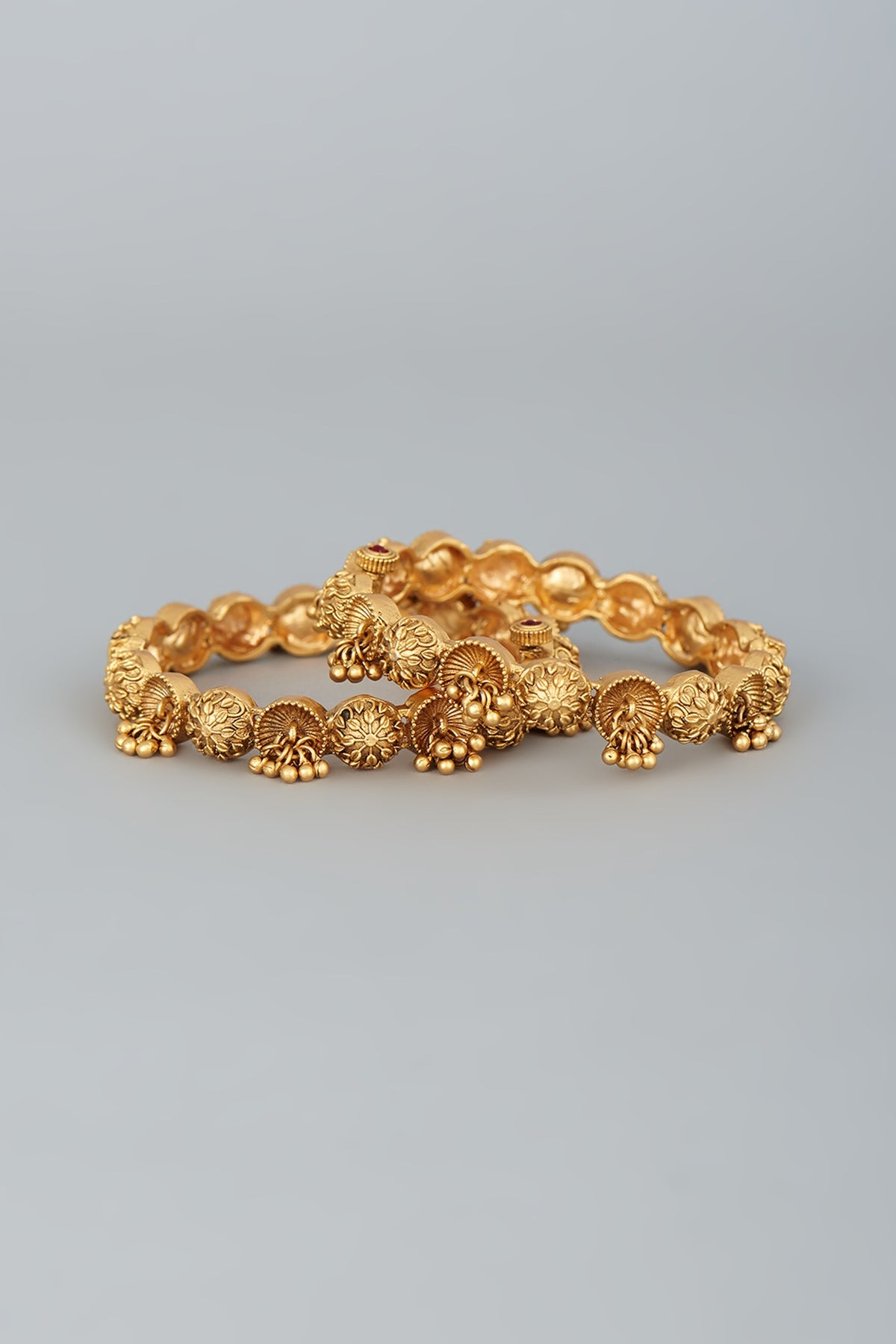 Gold Finish Temple Bangles With Golden Beads