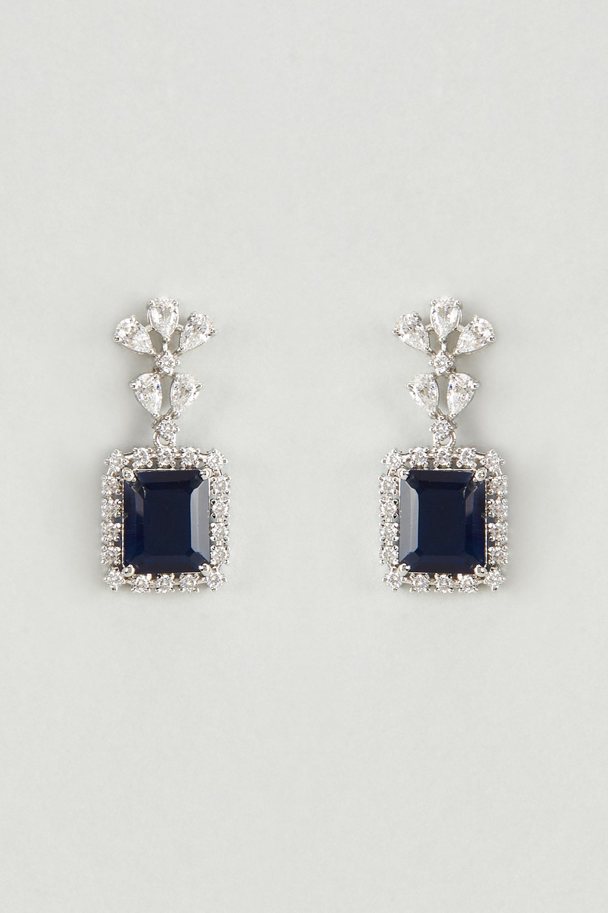 White Finish Swarovski Stone & Blue Crystal Dangler Earrings In Sterling Silver