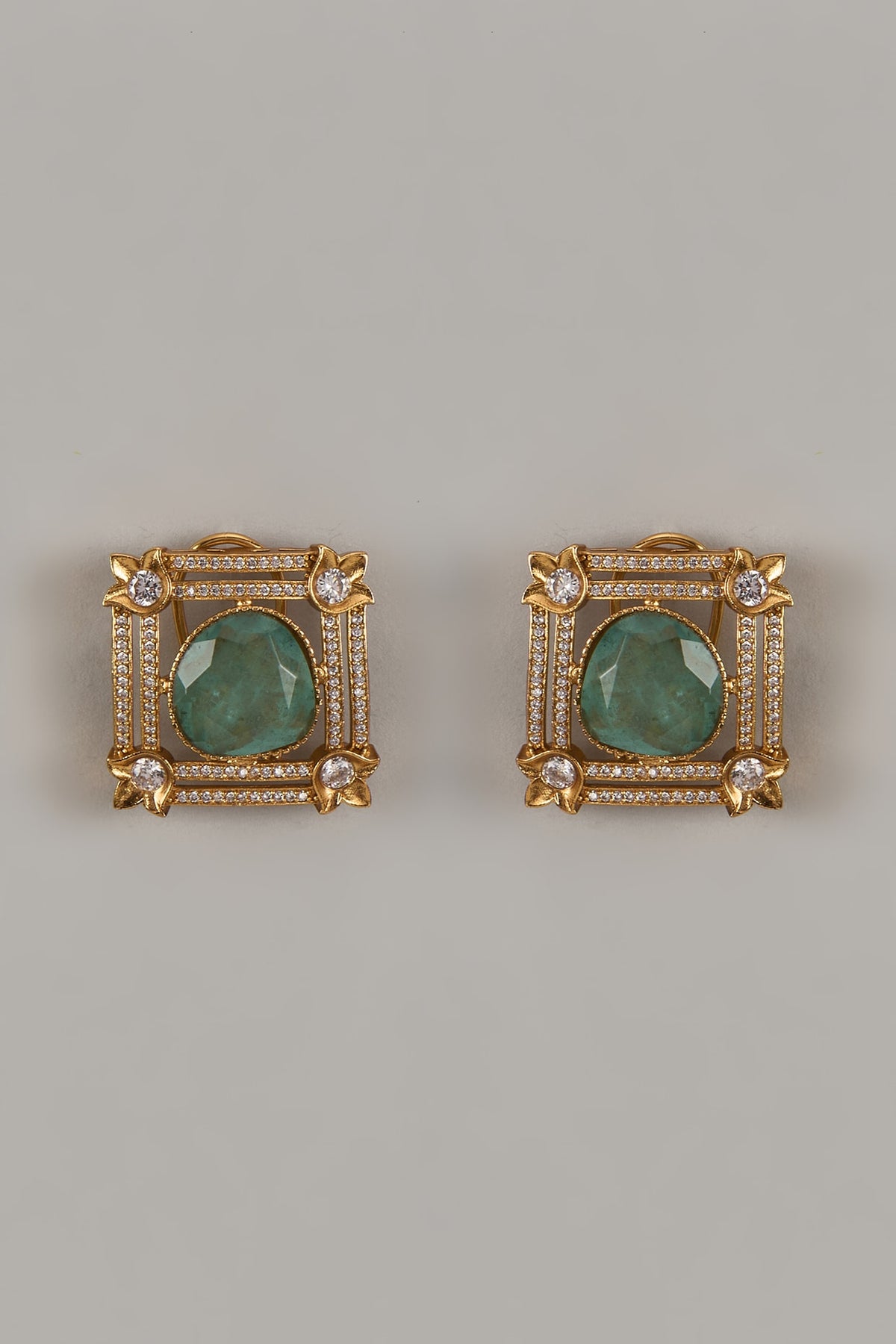 Gold Finish Uncut Zircon & Synthetic Mint Green Stone Stud Earrings