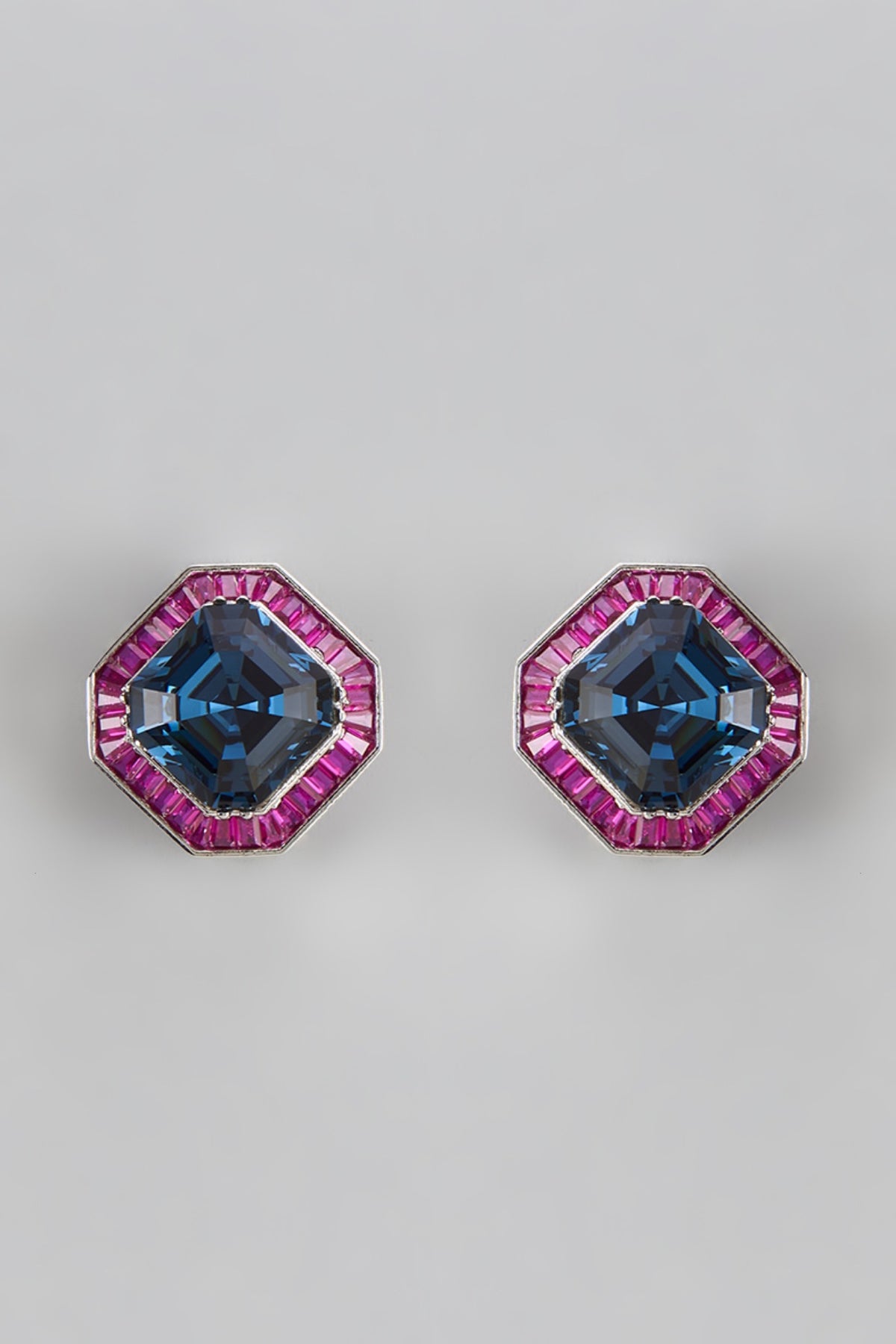 White Finish Ruby & Blue Stone Stud Earrings