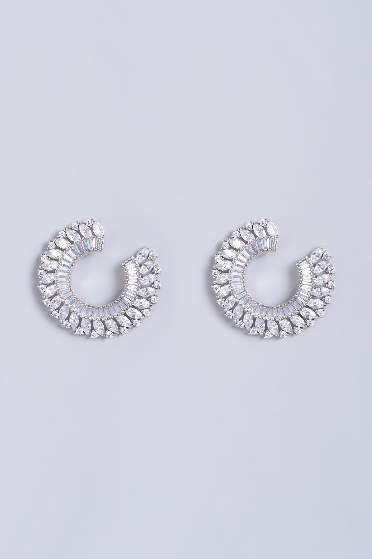 White Finish Stud Earrings With Faux Diamonds