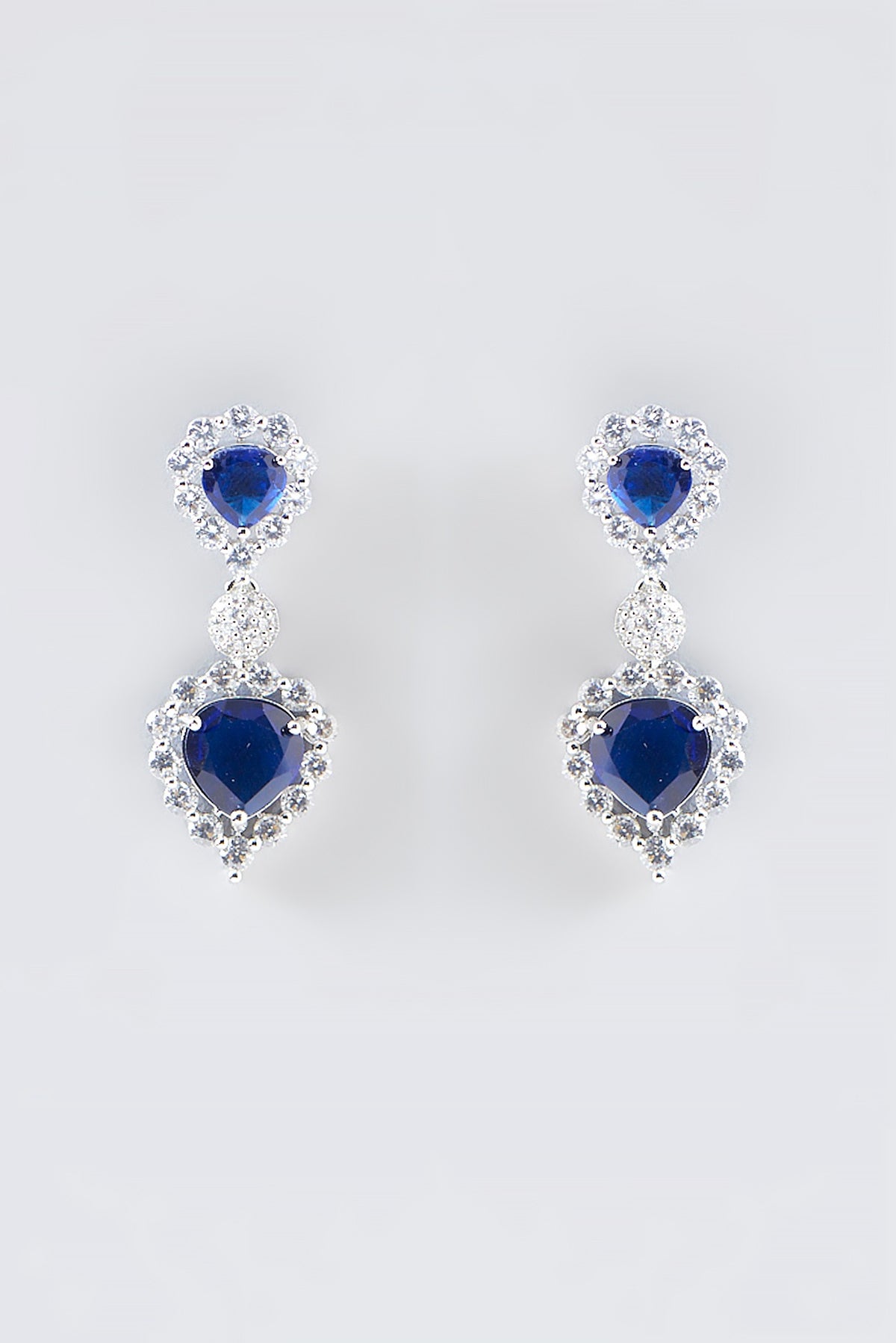 White Finish Faux Diamond & Blue Stone Dangler Earrings