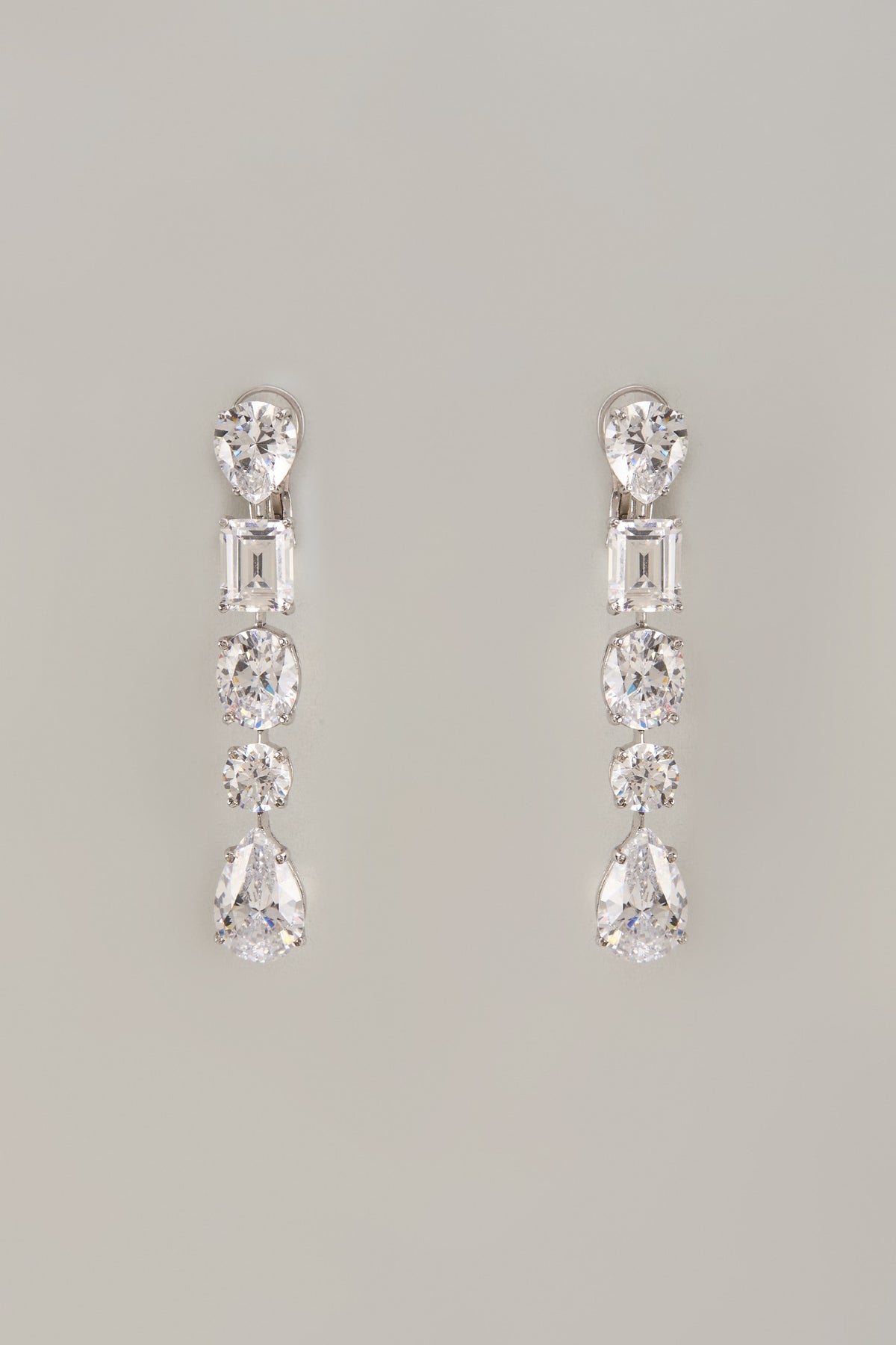 White Finish Zircon Dangler Earrings In Sterling Silver