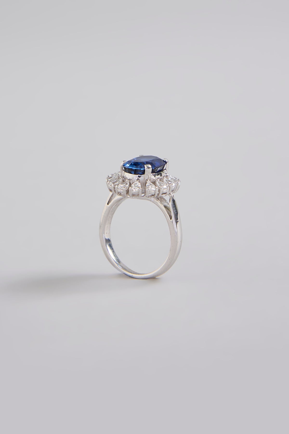 White Finish Blue Stone Ring In Sterling Silver