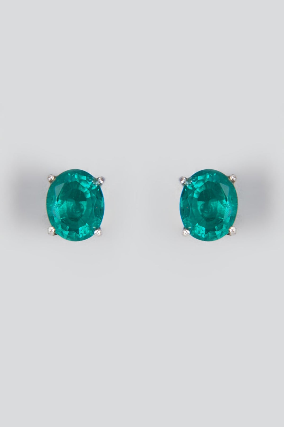 White Finish Synthetic Stone Stud Earrings In Sterling Silver