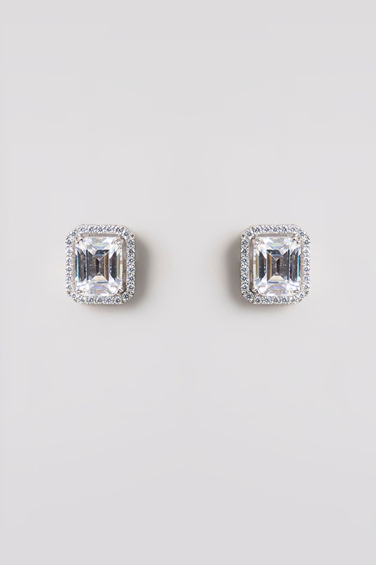 White Finish White Stone Stud Earrings In Sterling Silver