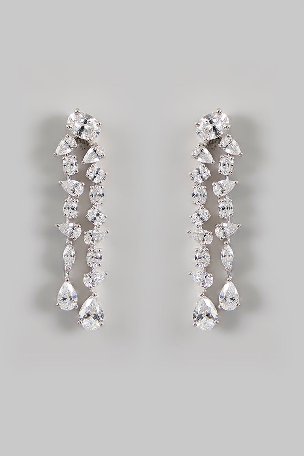 White Finish Zircon Dangler Earrings In Sterling Silver