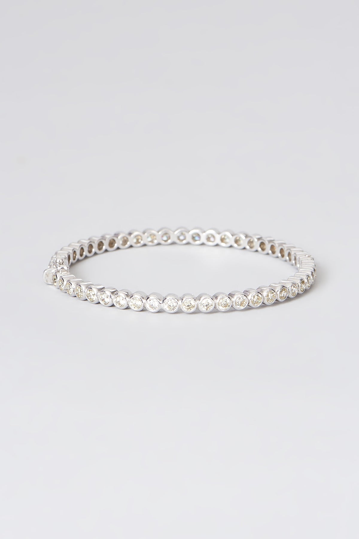 White Rhodium Finish Zircon Bangle In Sterling Silver
