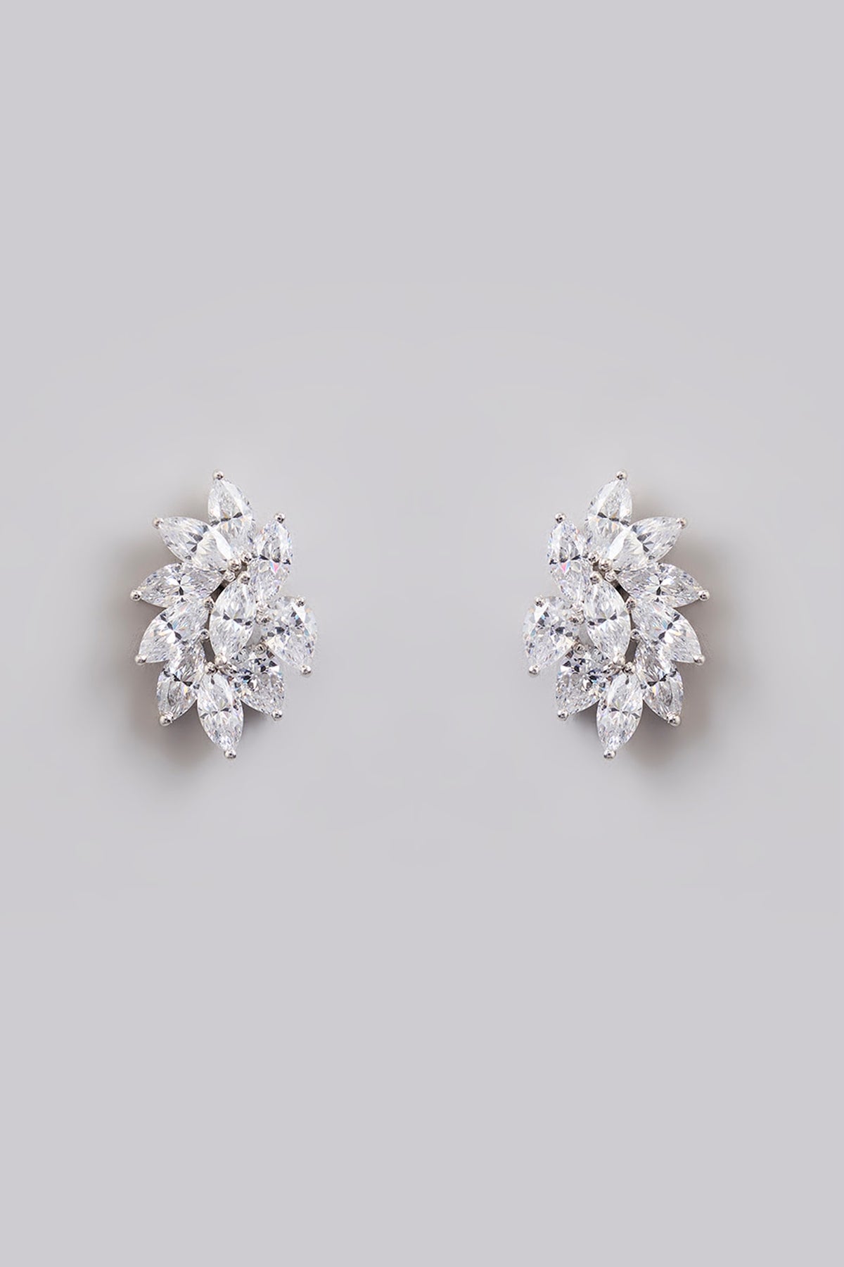 White Finish White Stone Stud Earrings In Sterling Silver