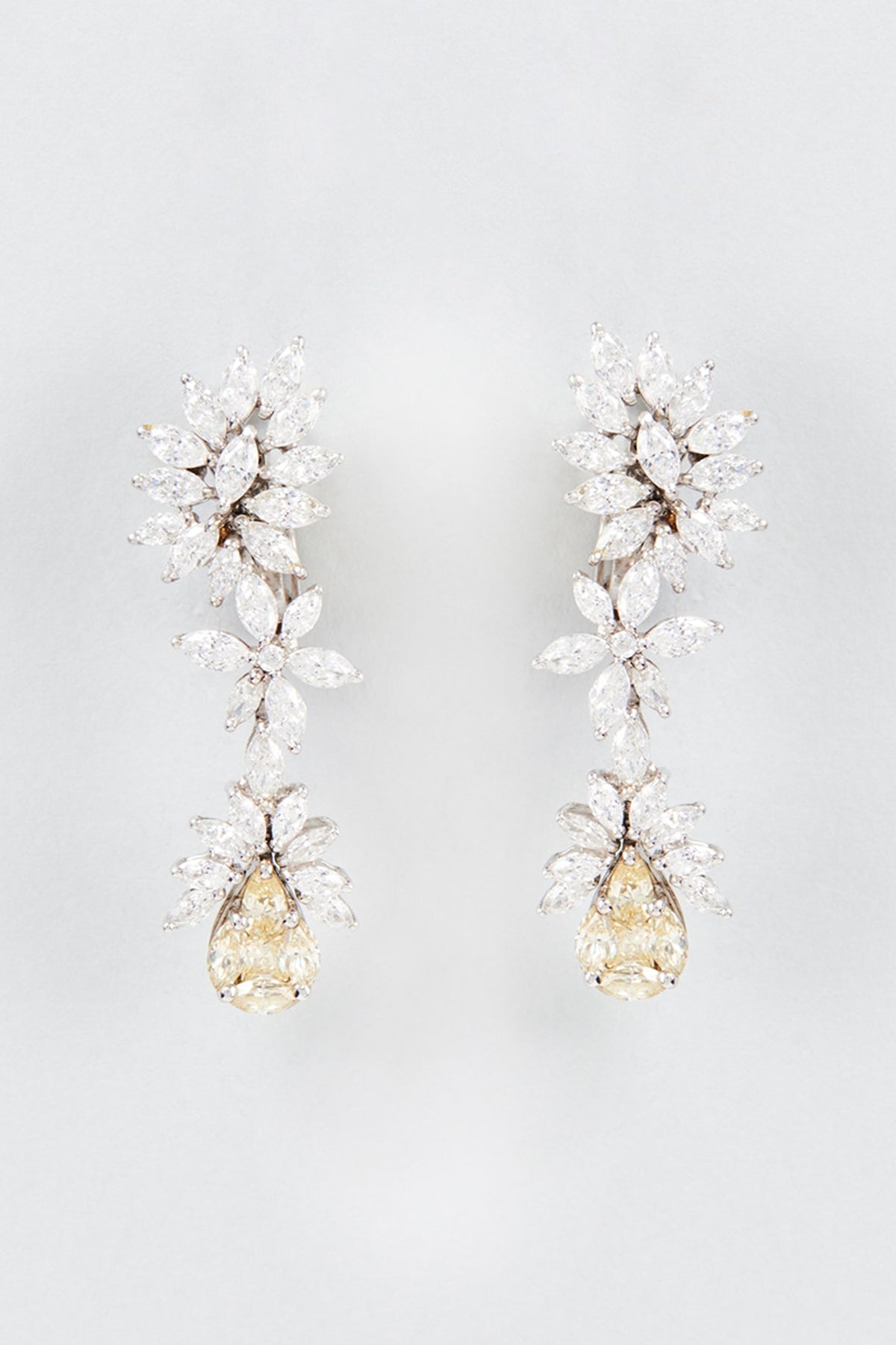 White Finish Swarovski Zirconia Dangler Earrings In Sterling Silver