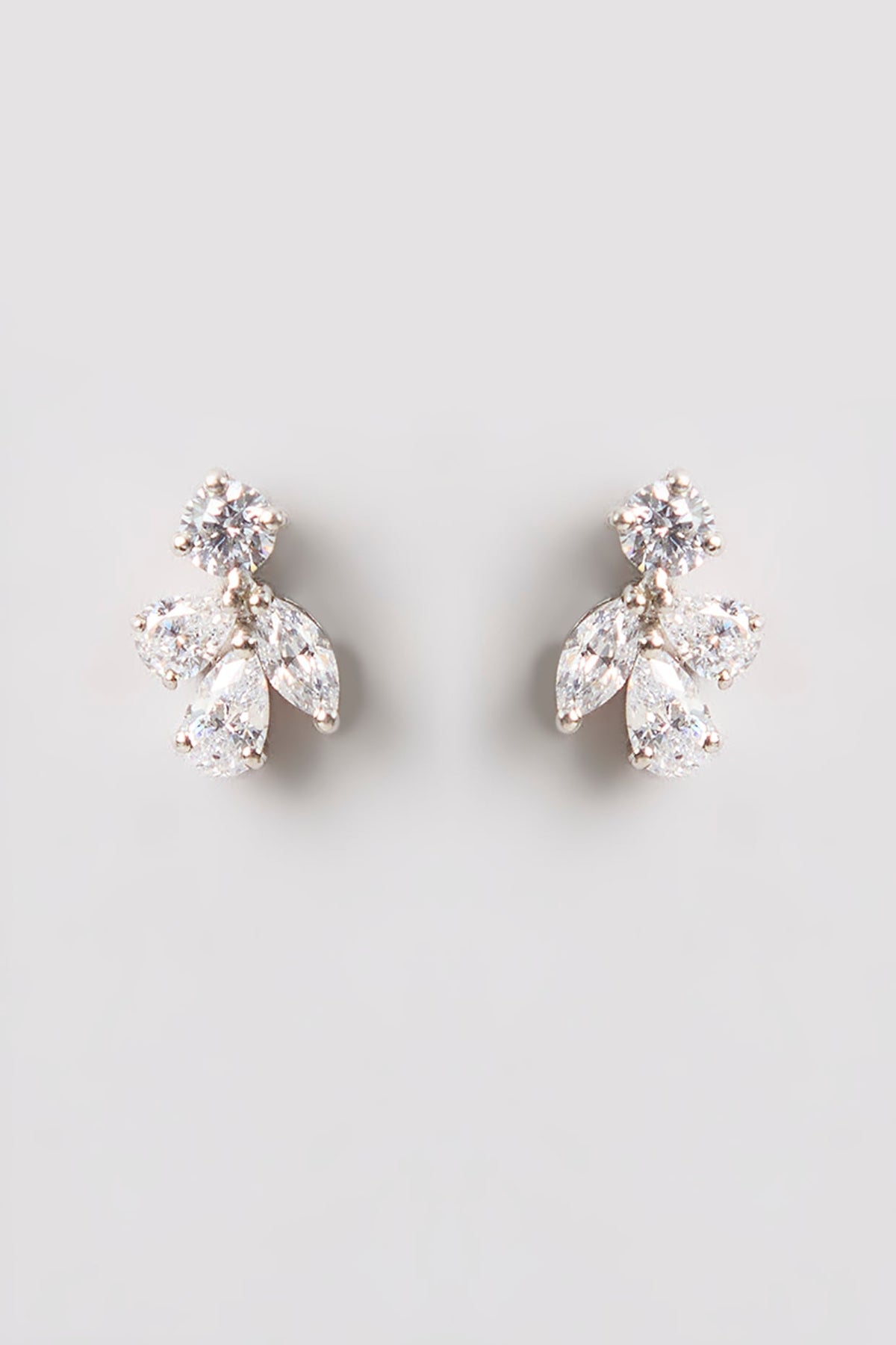 White Finish White Stone Stud Earrings In Sterling Silver