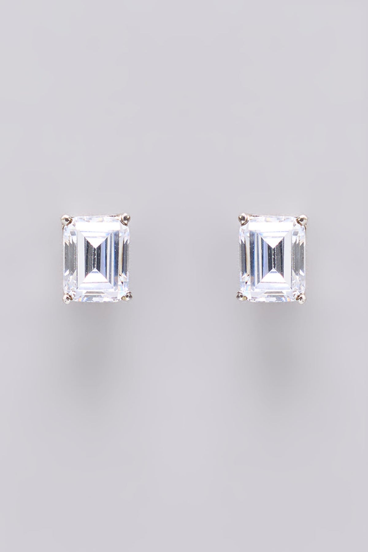 White Finish White Stone Stud Earrings In Sterling Silver