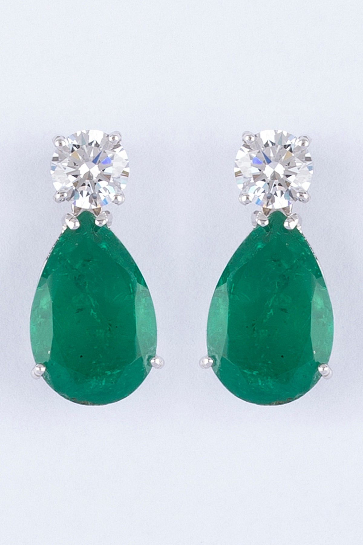 White Finish Emerald Dangler Earrings In Sterling Silver