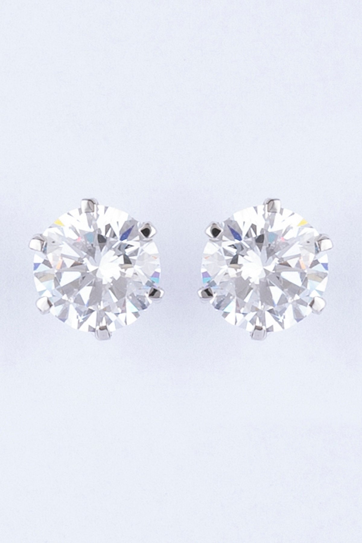 White Finish Lab Grown Zircon Stud Earrings In Sterling Silver