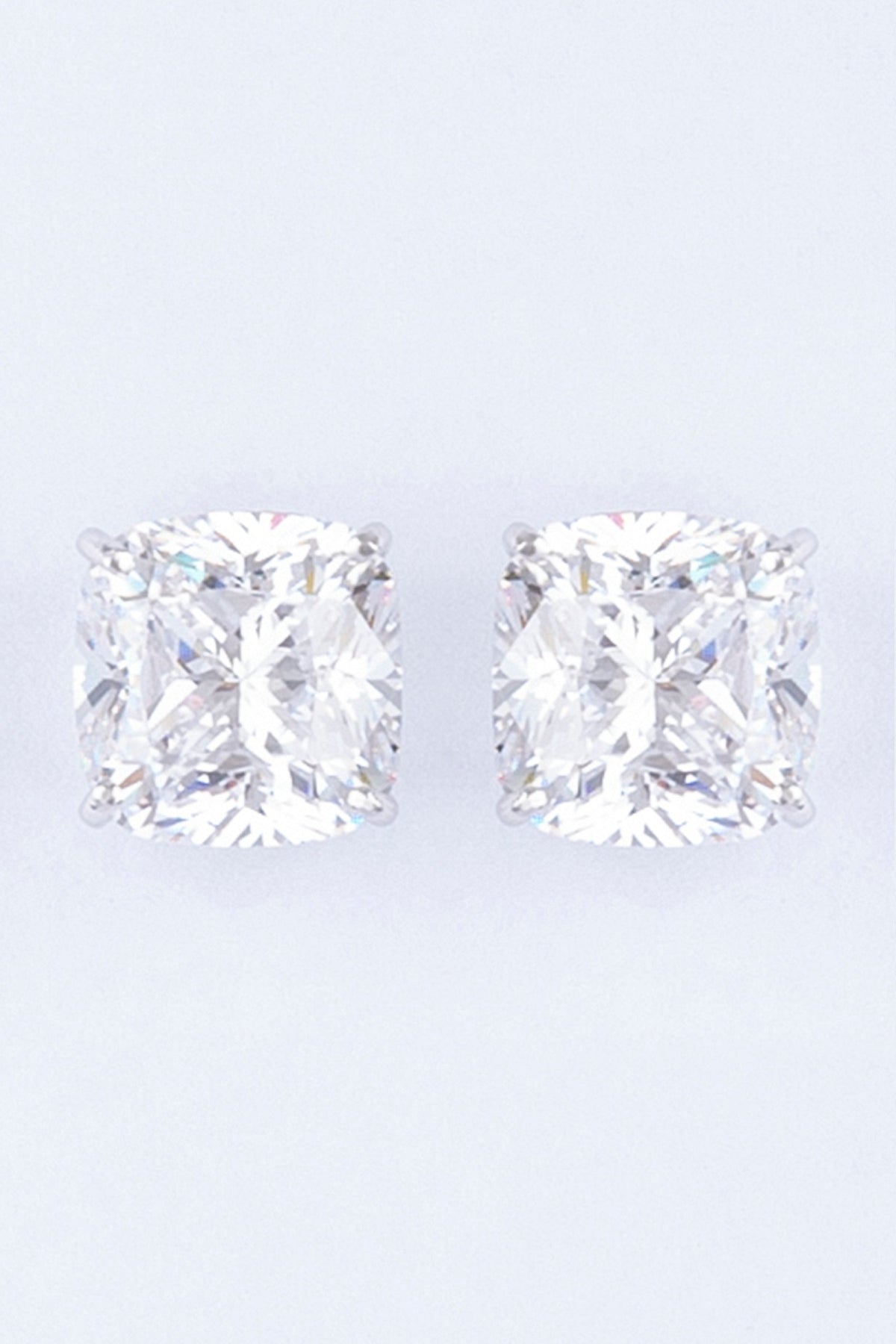 White Finish Stud Earrings With Cushion-Cut Zircon In Sterling Silver