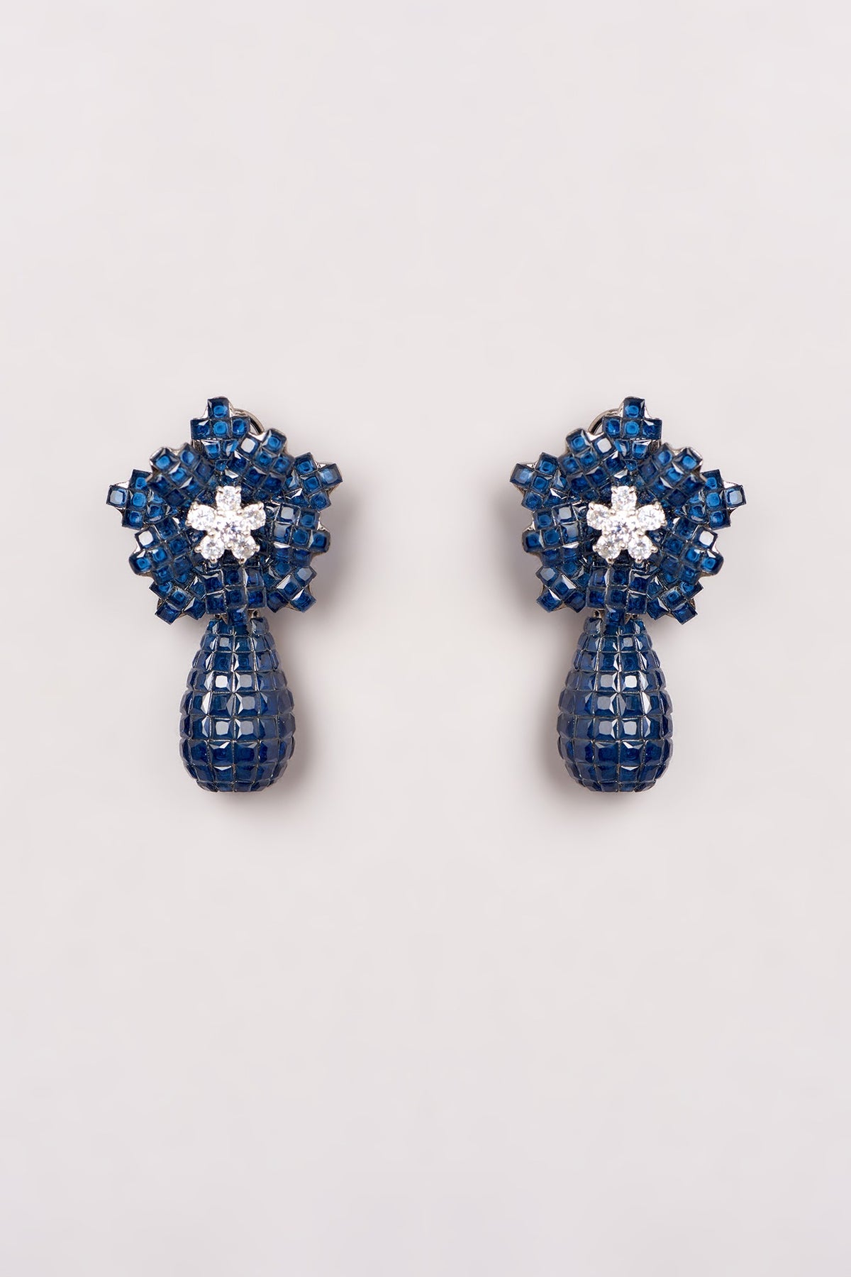 White Finish Blue Zircon Dangler Earrings