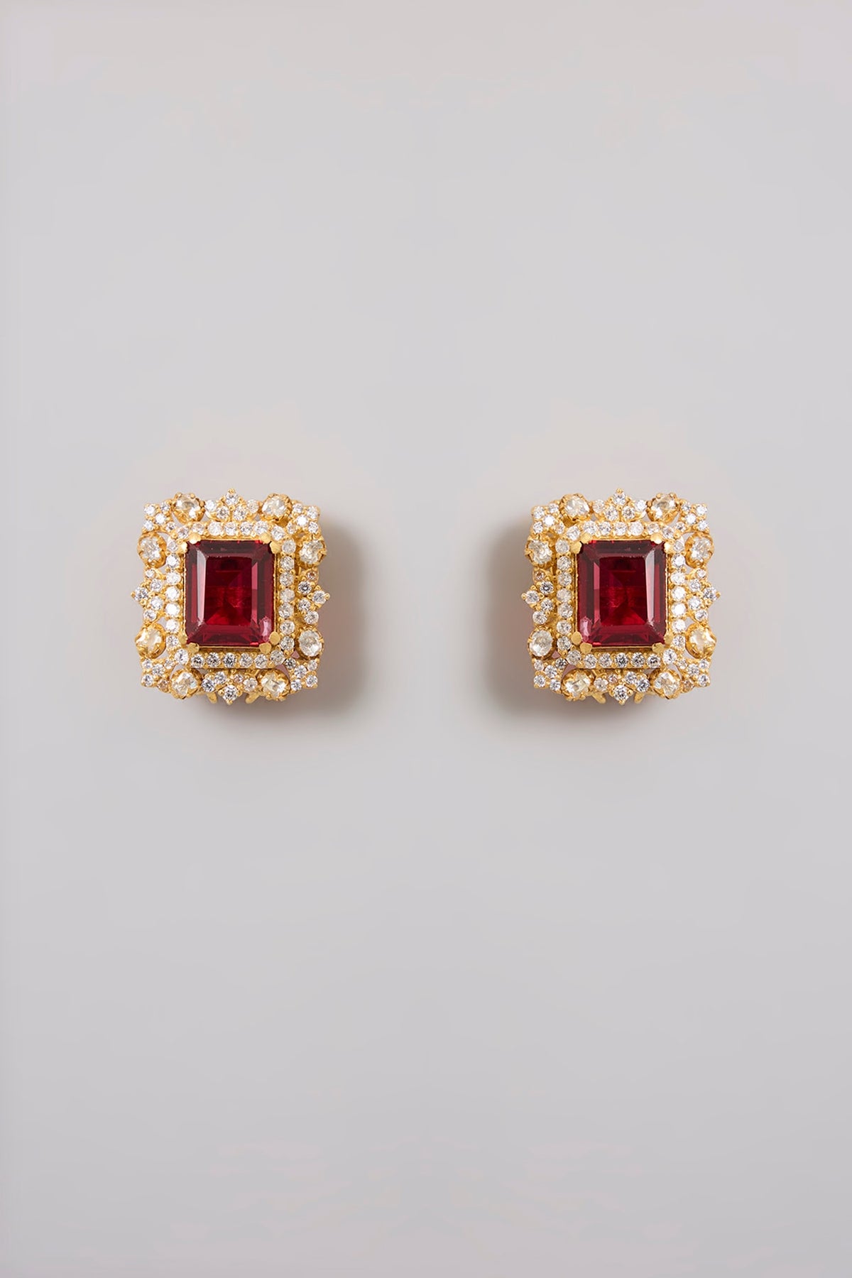 Gold Finish Kundan Polki & Ruby Stone Stud Earrings In Sterling Silver