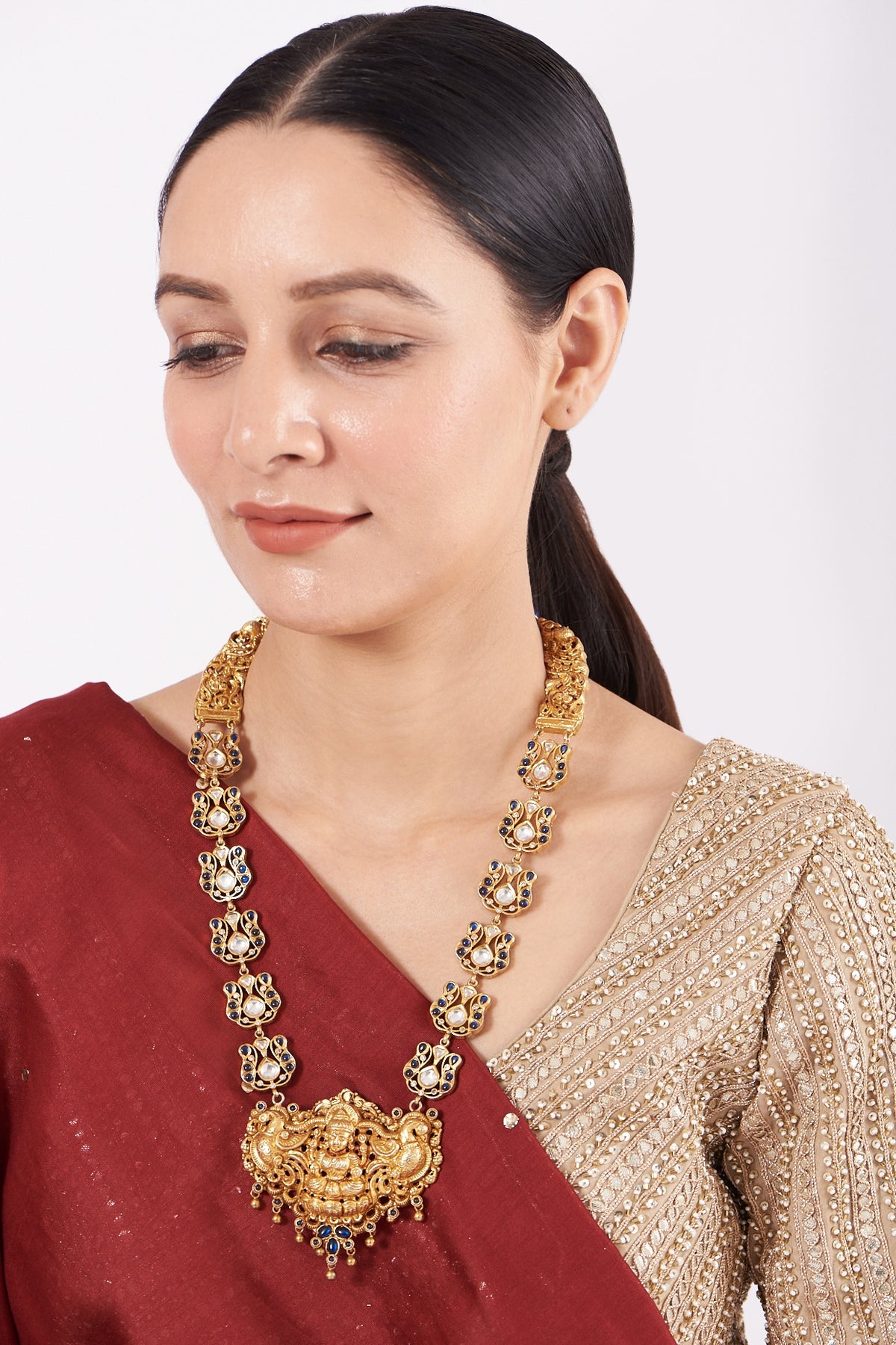 Gold Finish Sapphire Synthetic Stone Temple Necklace In Sterling Silver