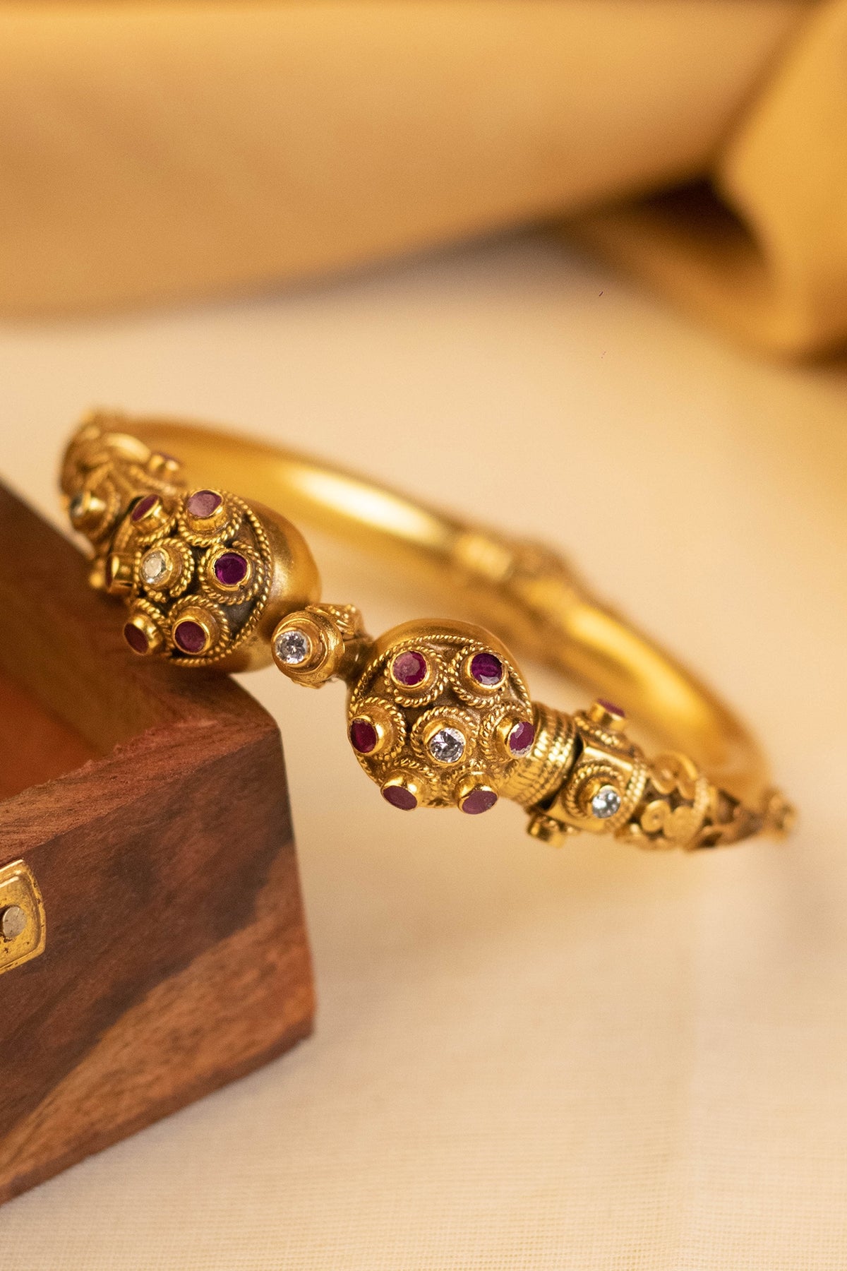 Gold Finish Onyx Temple Bangle In Sterling Silver
