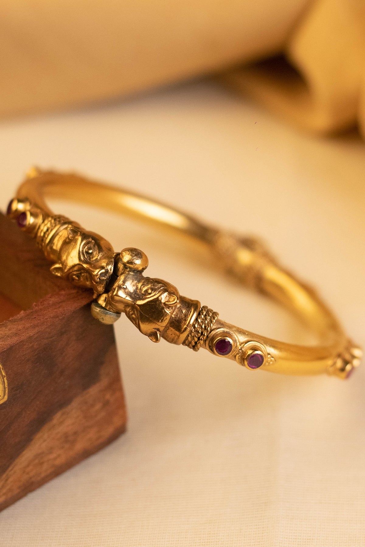 Gold Finish Onyx Temple Bangle In Sterling Silver