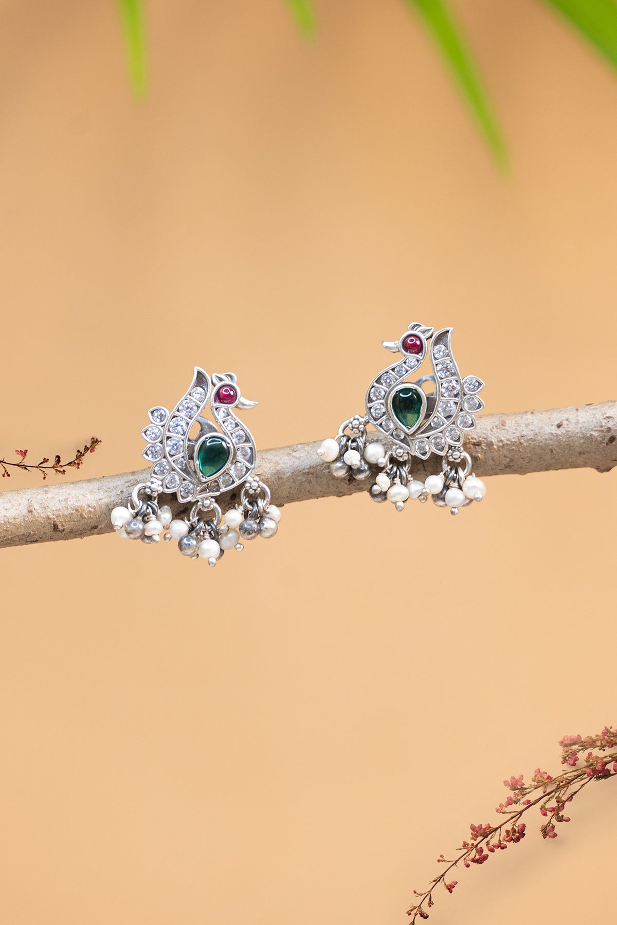 White Finish CZ Peacock Temple Stud Earrings In Sterling Silver