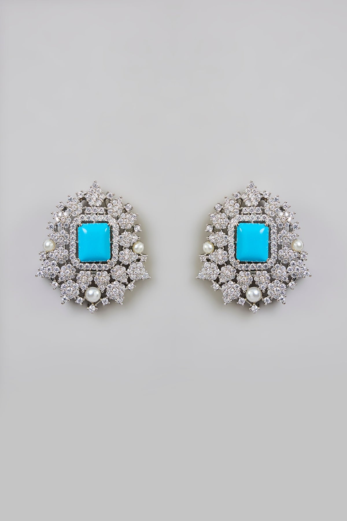 White Finish Blue Stone Stud Earrings