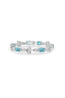 White Rhodium Finish Blue Cubic Zirconia Crystal Tennis Bracelet In Sterling Silver