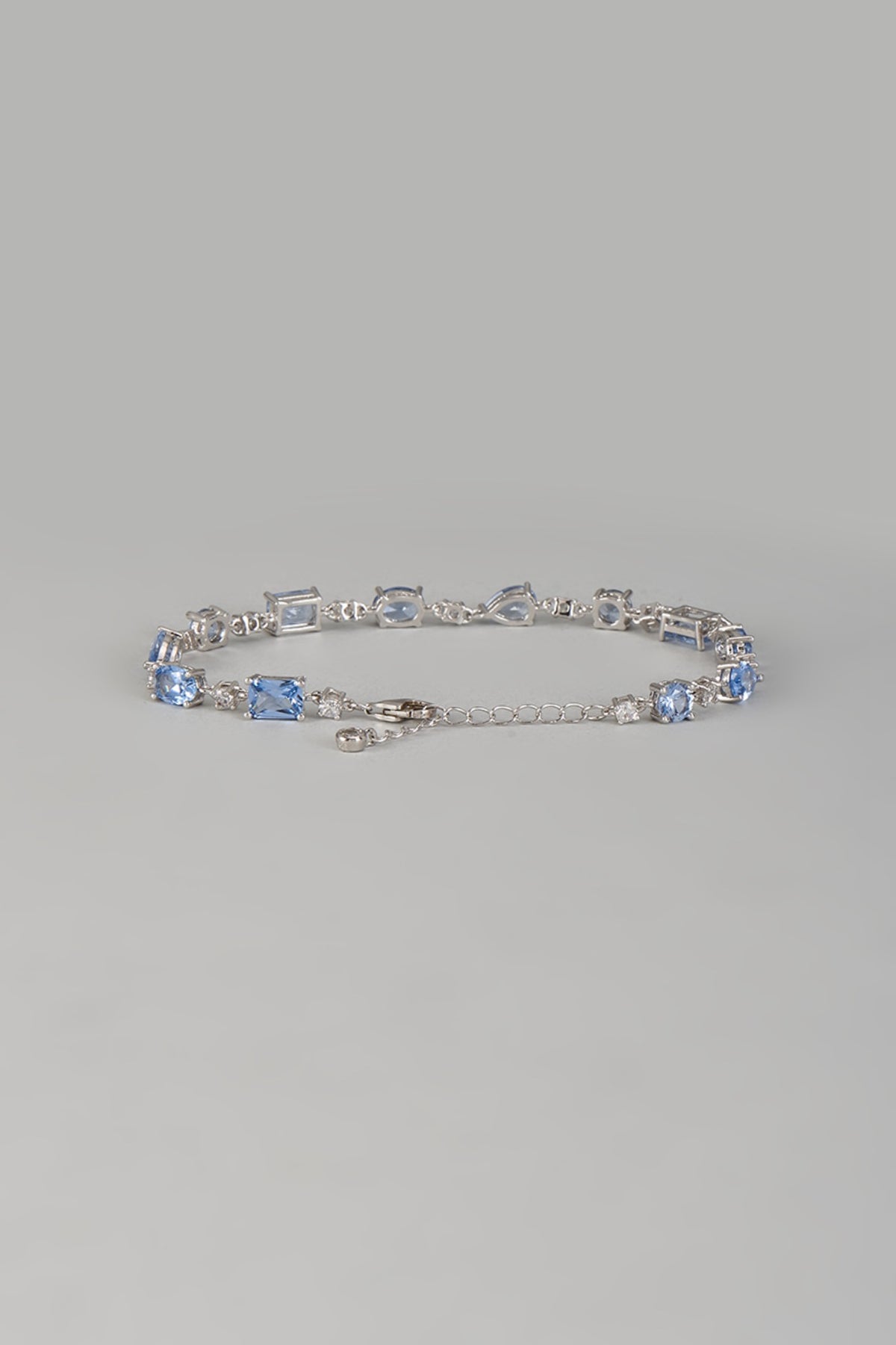 White Finish Aqua Blue Gemstone Tennis Bracelet In Hallmark Sterling Silver