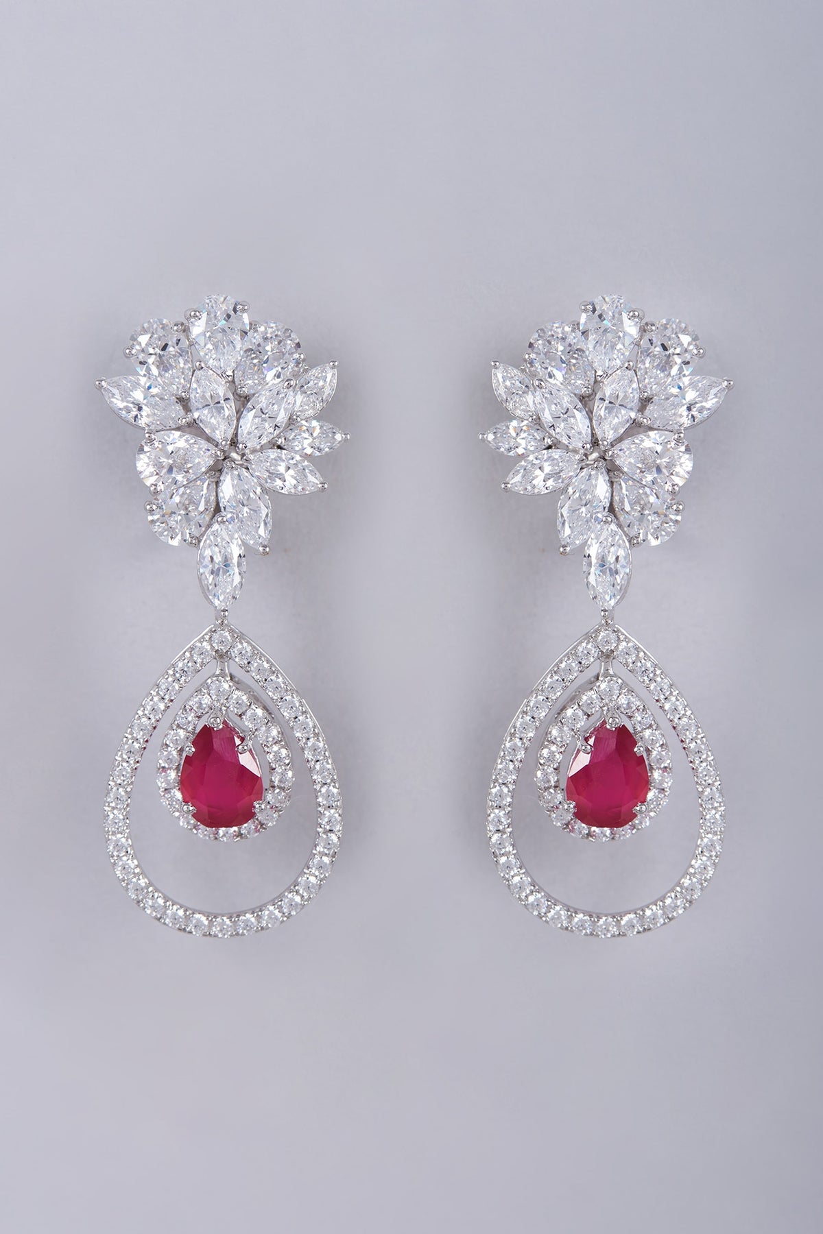 White Finish Semi-Precious Ruby Dangler Earrings In Sterling Silver