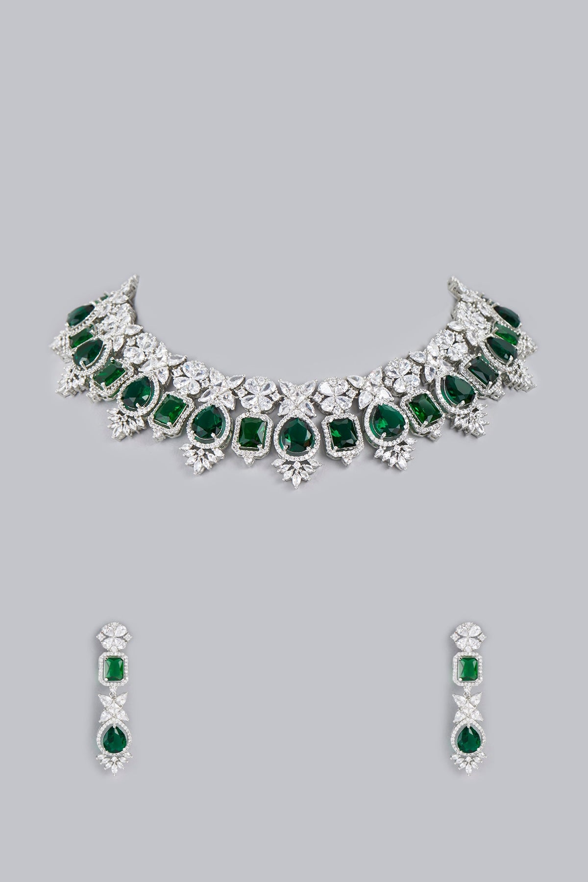 White Finish Necklace Set With Green Zircons