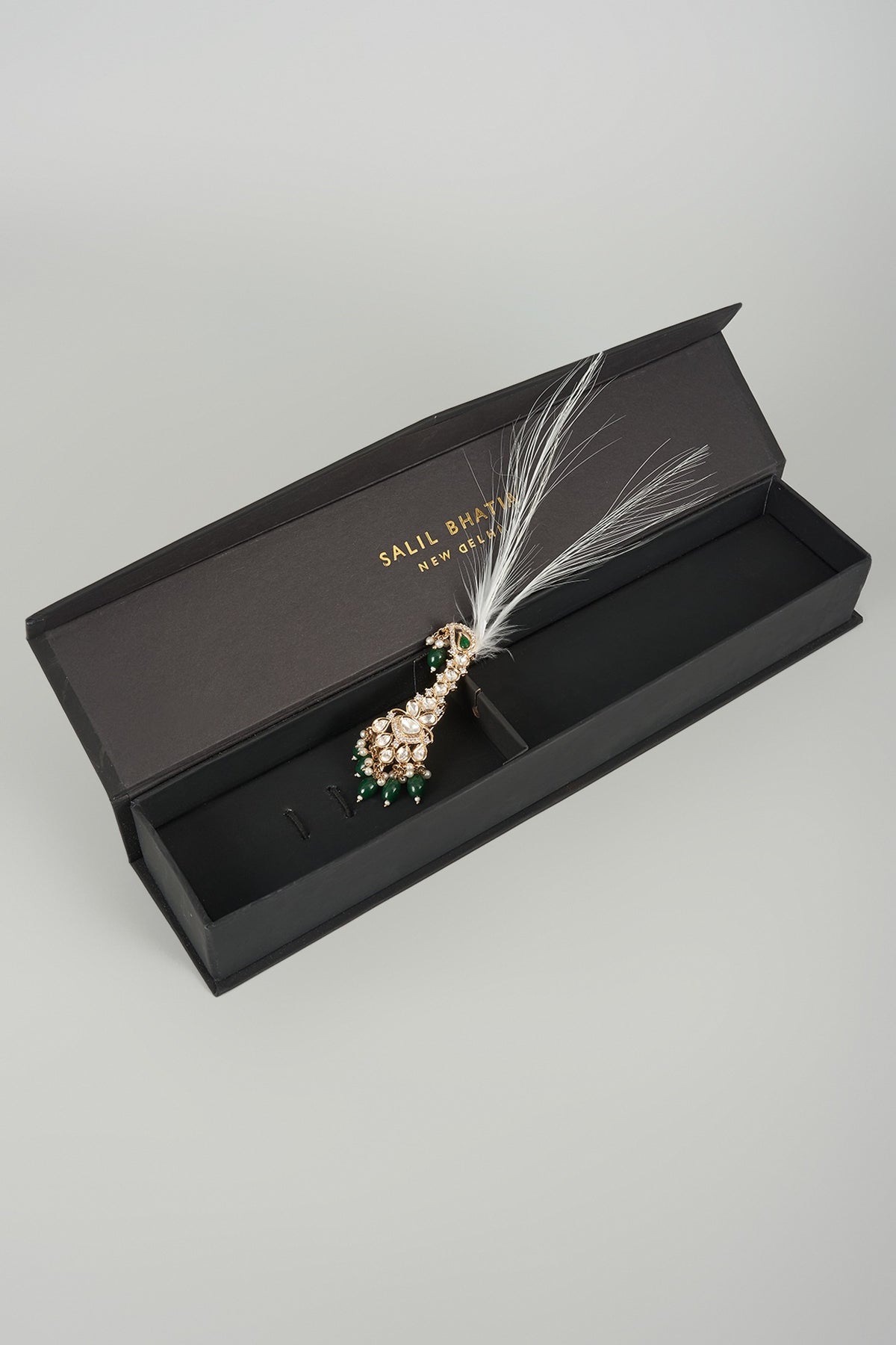 Gold Finish Kundan Polki & Emerald Feather Kalangi