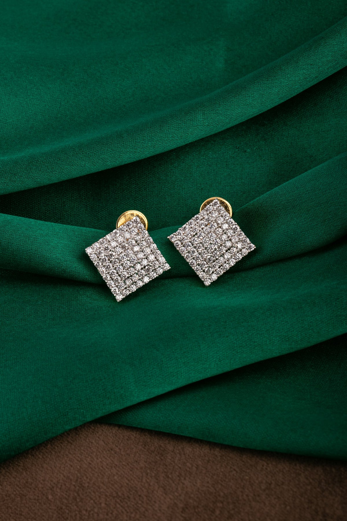 Gold Finish Zircon Stud Earrings In Sterling Silver