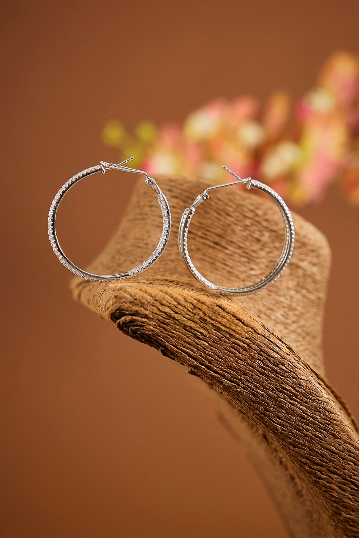 White Gold Finish Eurostar Zircon Hoop Earrings In Sterling Silver
