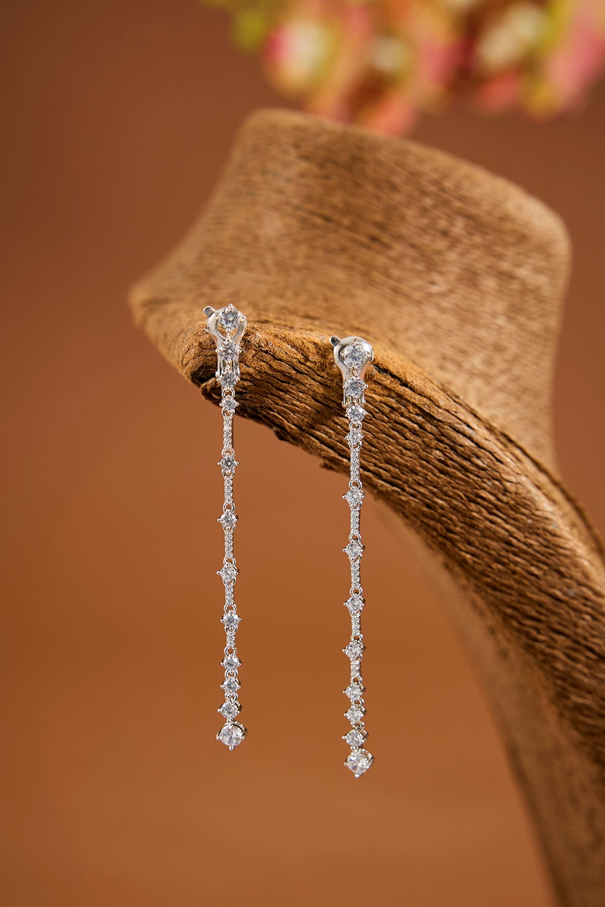 White Finish Eurostar Zircon Dangler Earrings In Sterling Silver