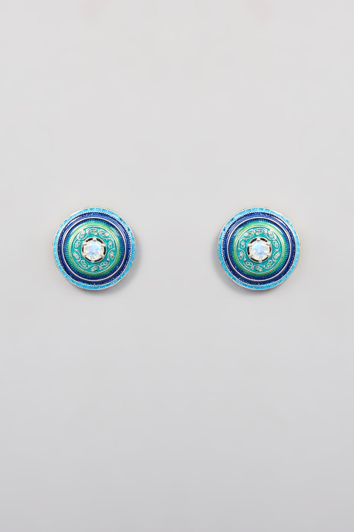 White Finish Blue Synthetic Stone Stud Earrings In Sterling Silver