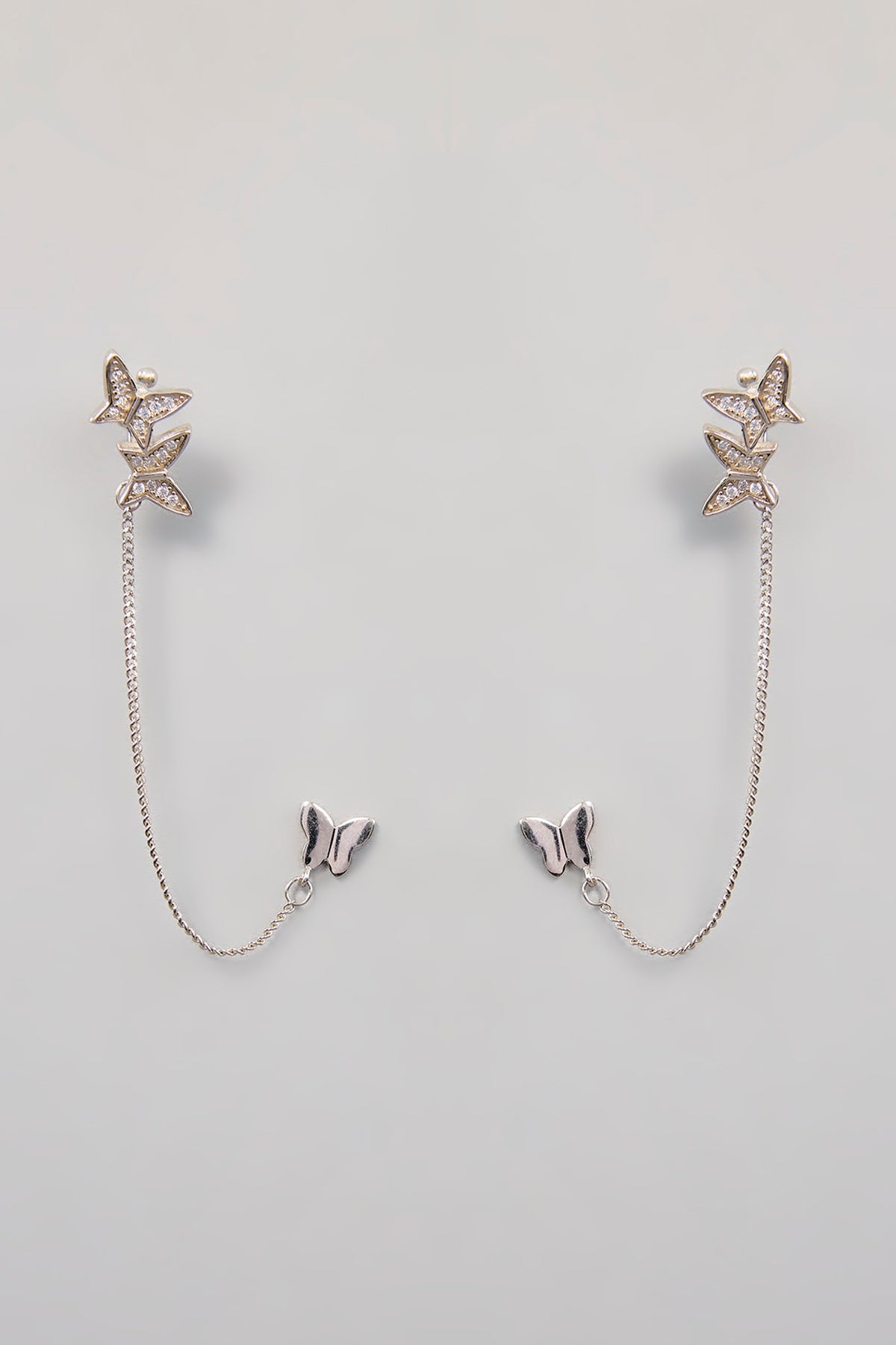 White Finish Zircon Stud Earrings In Sterling Silver