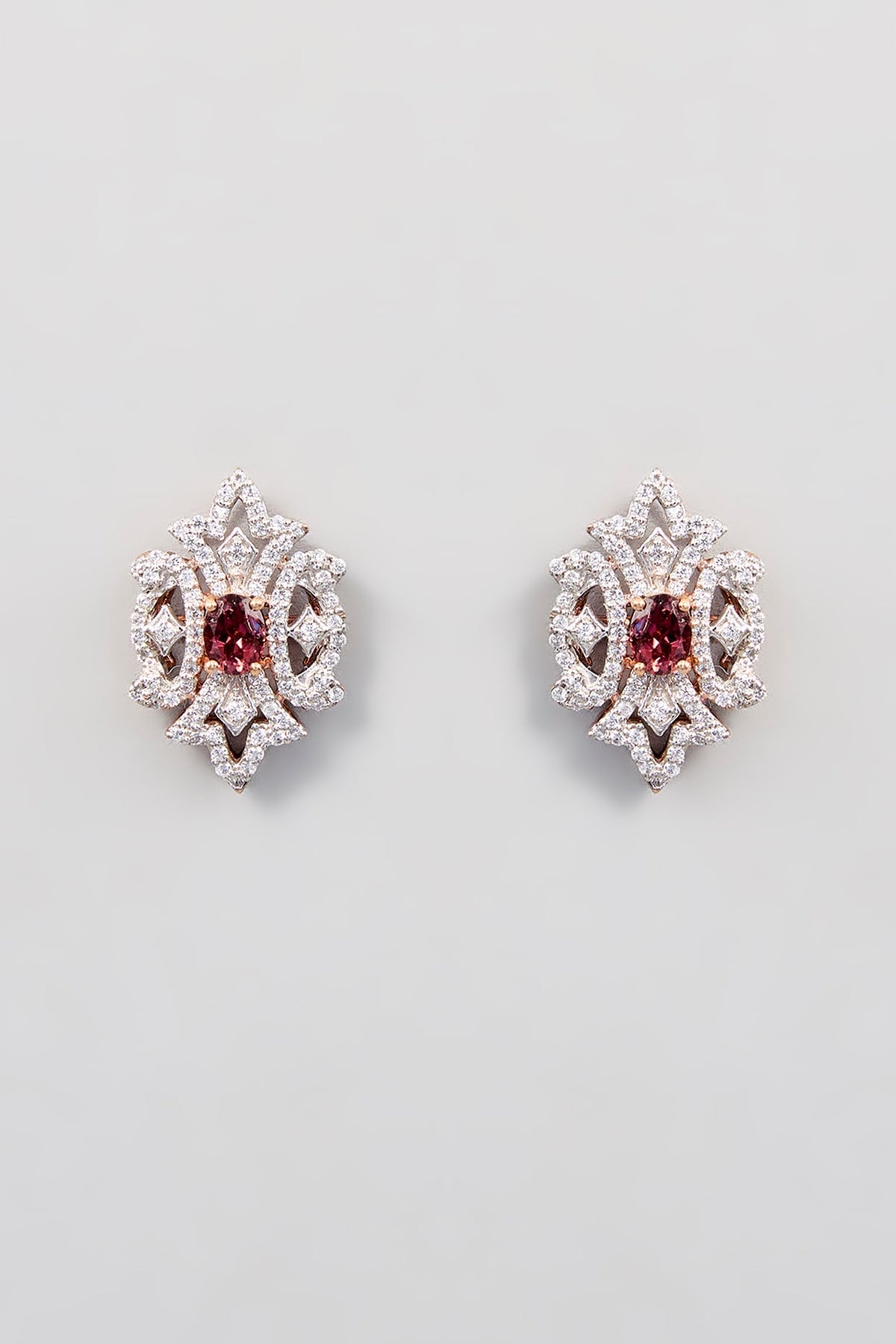 Gold Finish Zircon Stud Earrings In Sterling Silver
