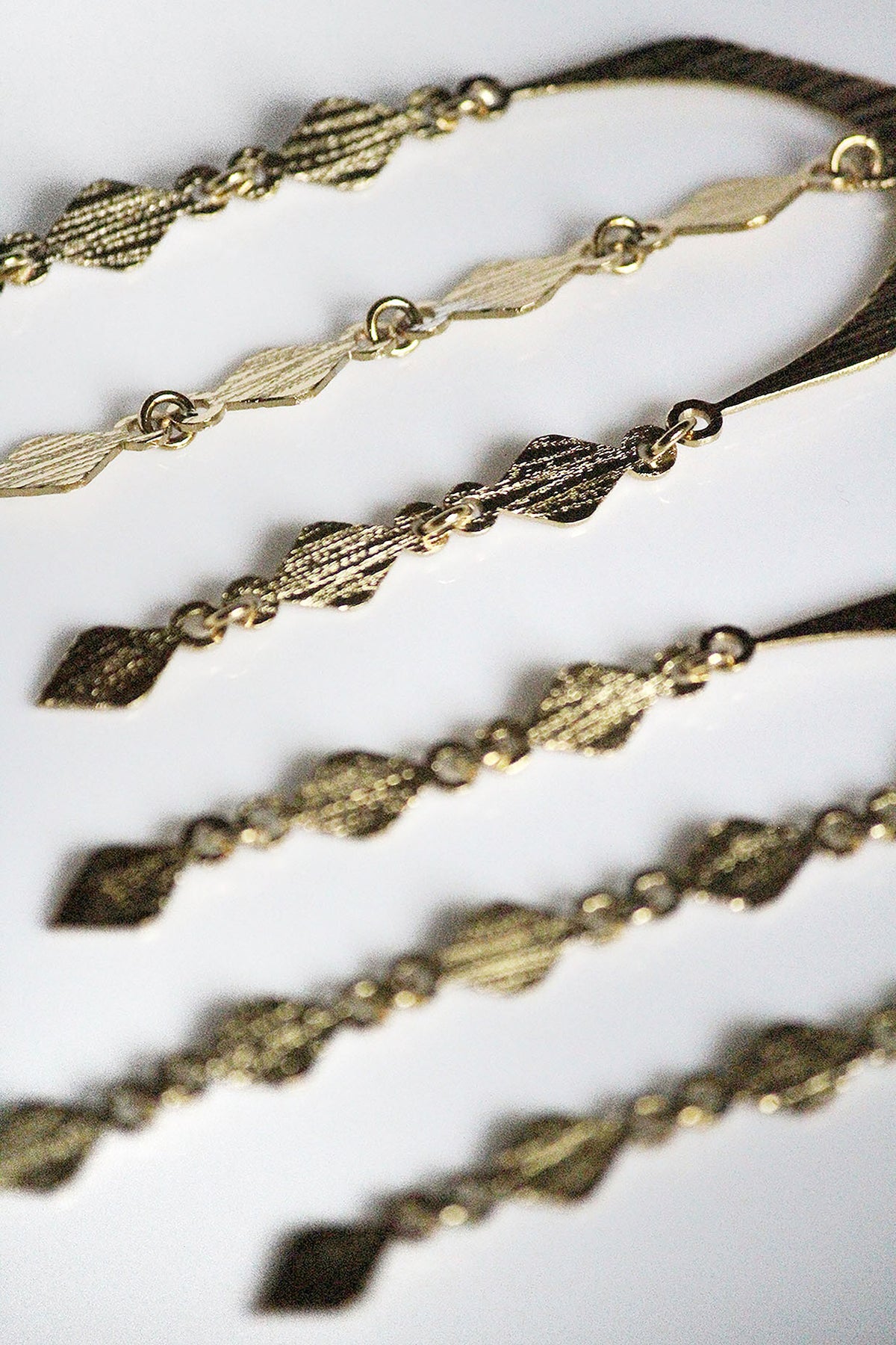 Gold Finish Handcrafted Textured Dangler Earrings