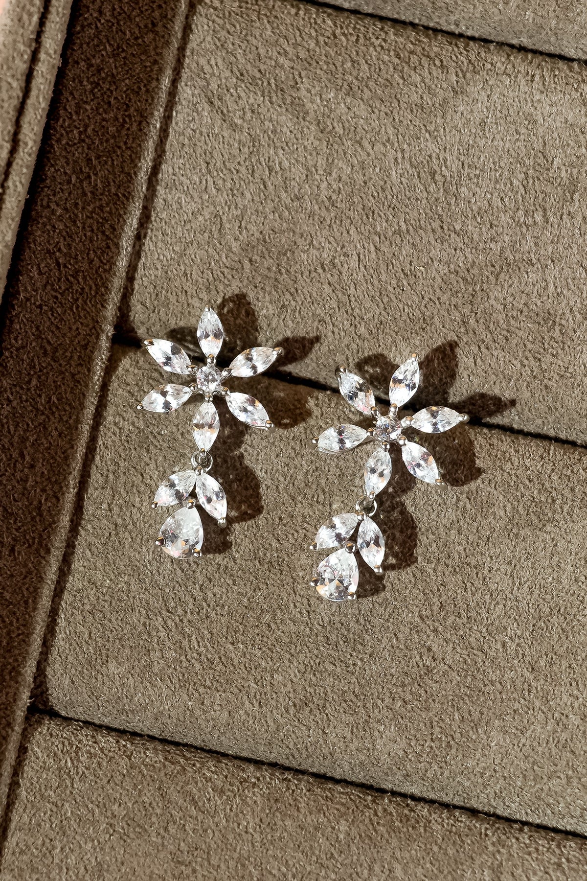 White Finish Dangler Earrings WIth Cubic Zirconia In Sterling Silver