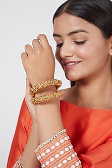 Gold Finish Carved Floral Bangles (Set of 2)