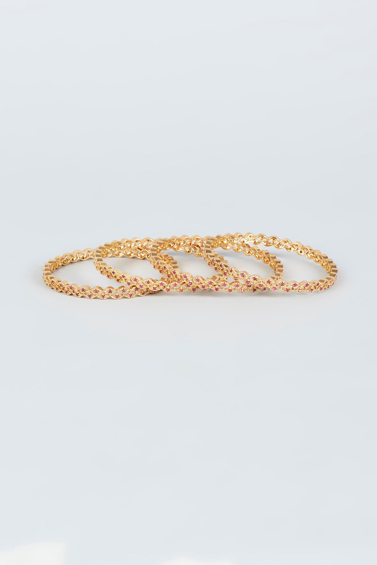 Gold Finish Mixed Metal Bangles (Set of 4)