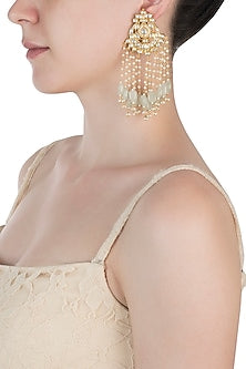 Gold plated kundan and mint green beaded tassel earrings