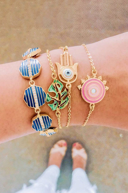 Gold Toned Soleil Charm Bracelet 