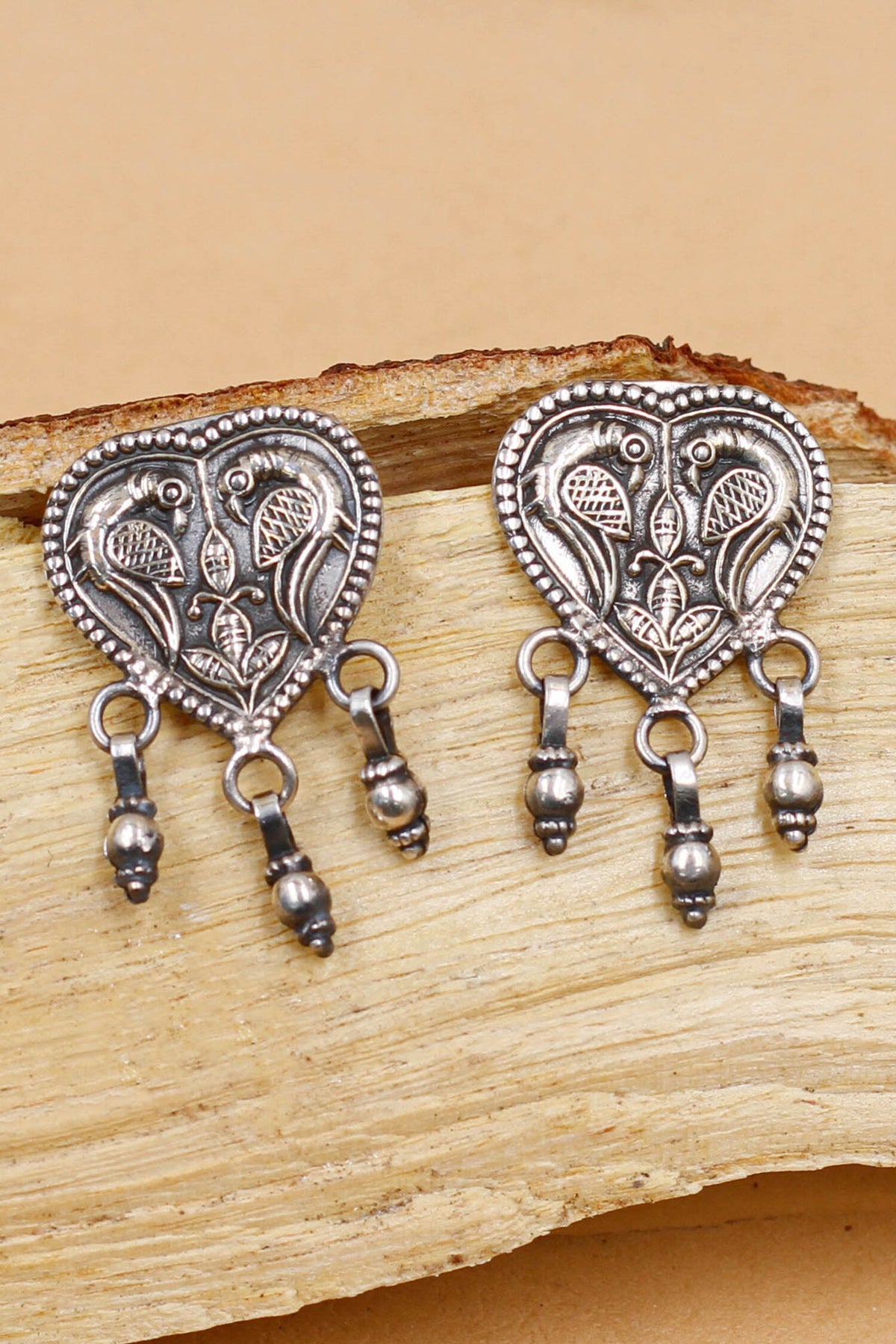 Carved Parrot Oxidised Drop Earrings 