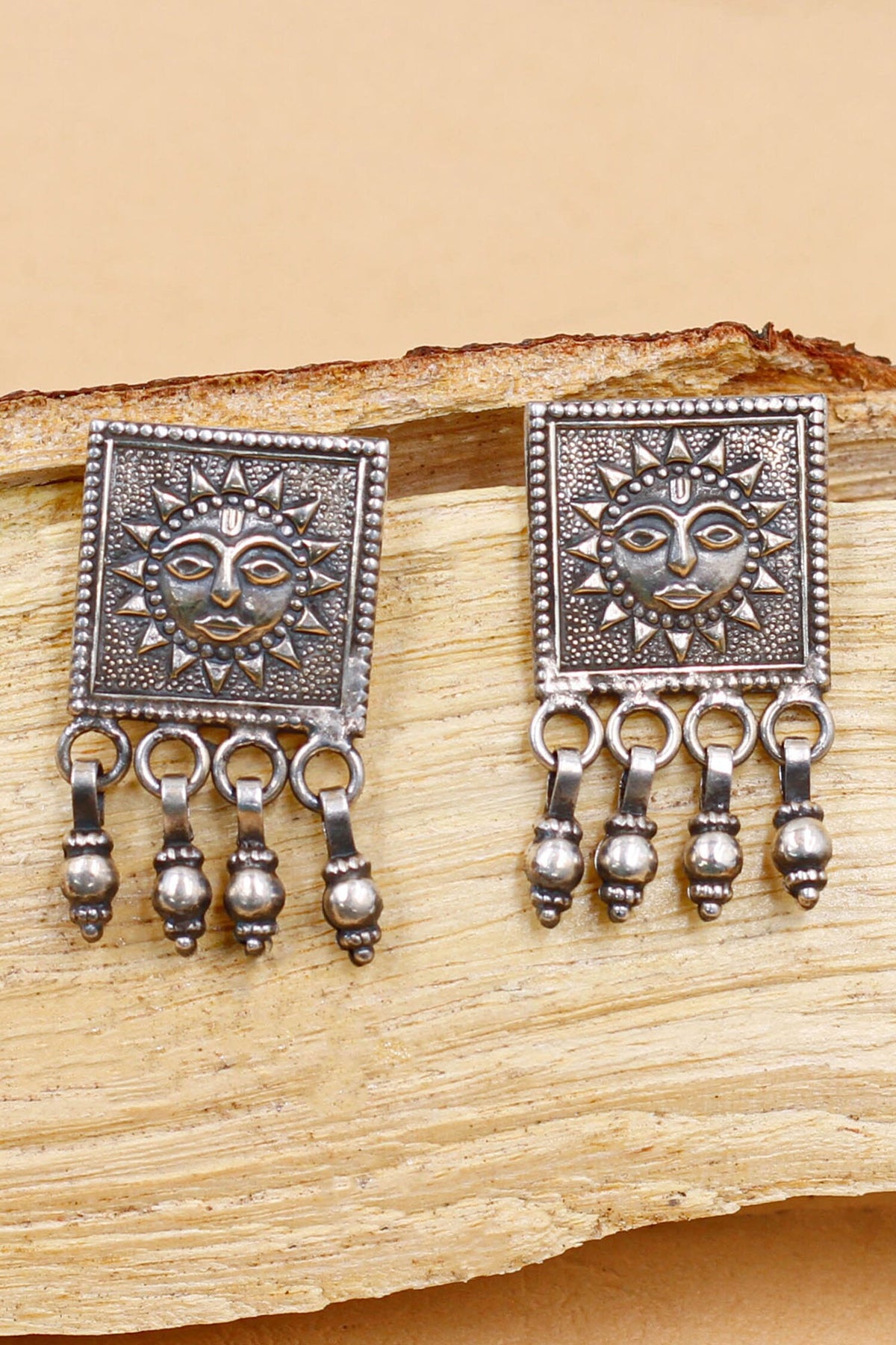 Radiant Sun Carved Oxidised Drop Earrings 