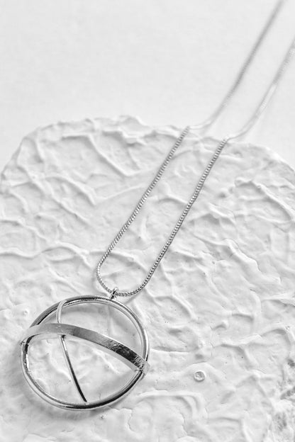 Nia Circular Carved Charm 
