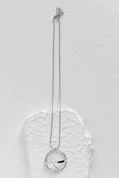 Nia Circular Carved Charm 