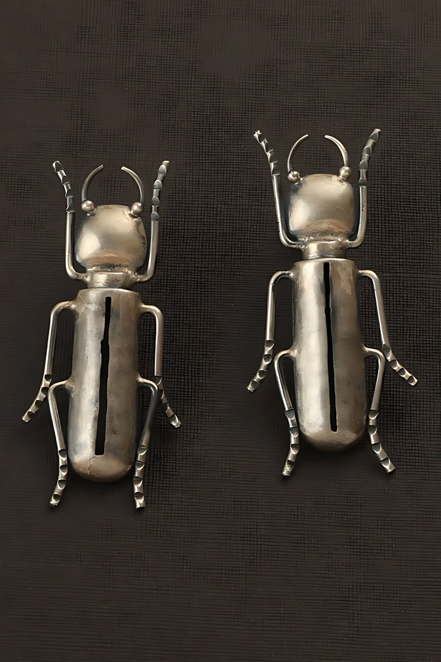 Bug Carved Long Earrings 