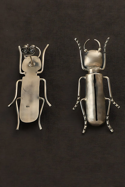 Bug Carved Long Earrings 